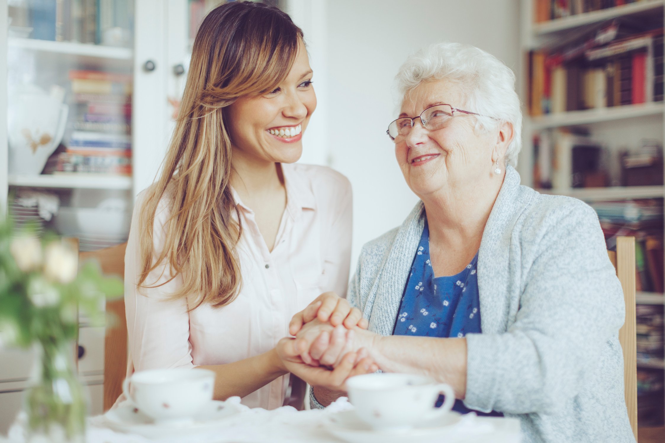 Social worker is visiting a senior woman